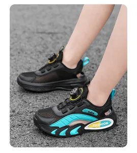Detailed side view of breathable black mesh kids' sneakers with turquoise accents