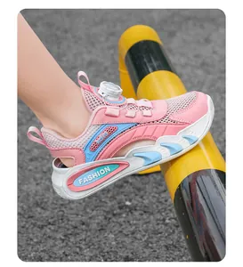 Close-up of pink children's mesh sneakers with adjustable rotary buckle
