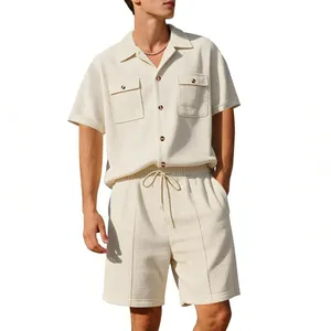 Detail view of cream waffle knit fabric on men's casual two-piece shirt and shorts set