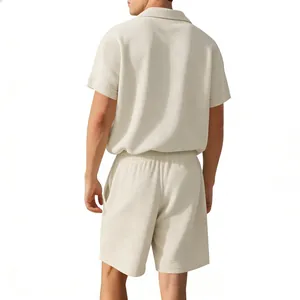 Back view of men's waffle knit short sleeve shirt and matching shorts in cream color