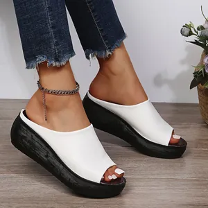 Stylish white peep-toe wedge slippers with chunky black platform sole for women