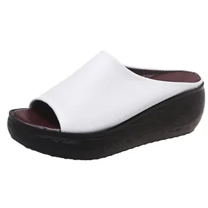 Elegant white peep-toe wedge platform slippers for women with thick textured black sole