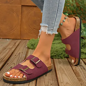 Burgundy women's slide sandals with double buckles and cork-textured platform sole