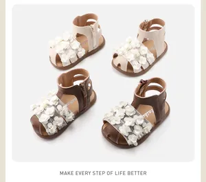 Detail of baby girls' floral sandals with soft anti-slip soles for summer comfort