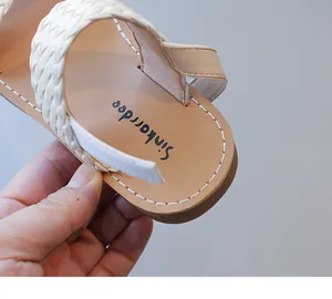 Close-up of kids breathable summer sandals showing heel strap and branded insole detail