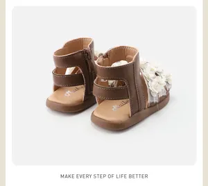Rear view of brown toddler girl sandals with white flowers and soft non-slip soles