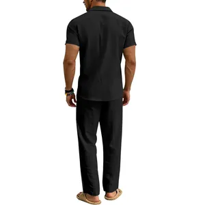 Back view of a men's black linen short sleeve shirt and long casual pants two-piece set