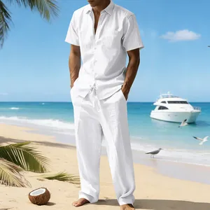 Men's summer white linen short sleeve shirt and loose trousers two-piece set on a sunny beach