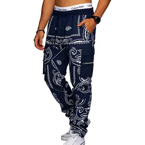 Detail view of men's navy paisley cargo pants with multi-pocket hip-hop high street style