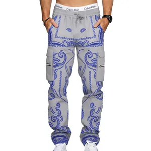Detailed view of men's grey paisley cargo pants with blue hip-hop patterns and pockets