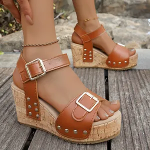 Women's brown platform wedge sandals with rivets and buckle strap decoration