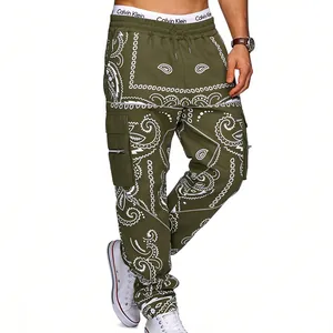 Men's green cargo pants featuring white paisley prints and functional multi-pocket design