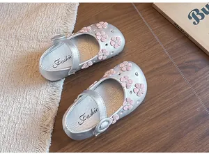 Elegant silver princess shoes for girls with pink floral embroidery and buckle straps