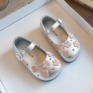 Elegant silver girl's Mary Jane shoes with pink floral applique and metallic finish