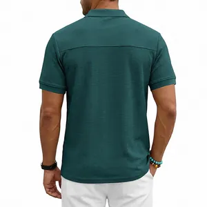 Detailed back view of men's waffle knit polo shirt in dark teal featuring heavy texture