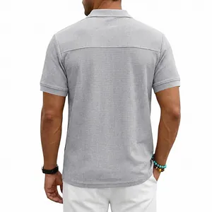 Detailed back view of a men's grey waffle knit polo shirt showing heavy texture