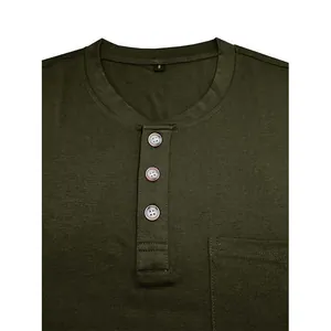 Close-up of olive green men's Henley shirt featuring pocket and button neckline detail
