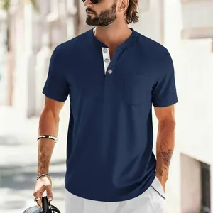Close-up detail of a navy blue men's Henley t-shirt with a chest pocket and white trim.