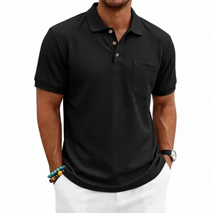 Close-up detail of black waffle knit polo shirt showing heavy texture and chest pocket