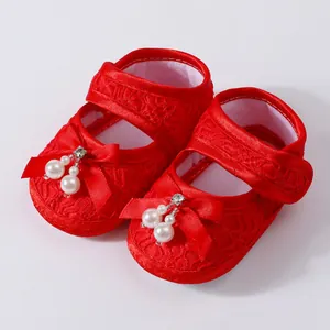 Elegant red lace baby girl princess shoes with pearl bow detail and soft soles for infants
