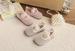 Group view of breathable mesh girl's princess shoes with pearl ribbon bows in pink and beige