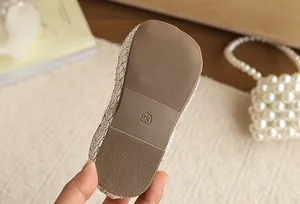 Detailed view of the durable anti-slip sole on a girls' mesh princess shoe, size 23.