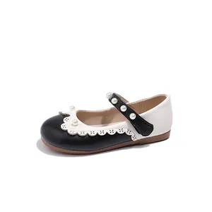 Elegante schwarz-weiße Mädchen Mary Jane Prinzessin Schuhe mit Perlen und Wellenrand