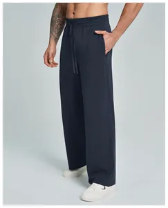 Detailed side view of men's navy blue modal straight-leg sports trousers for hiking