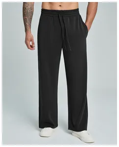 Detailed view of men's black modal straight leg sports pants with drawstring waist.