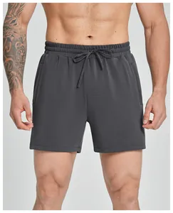 Close-up of men's dark grey modal sports shorts with drawstring waist and pockets