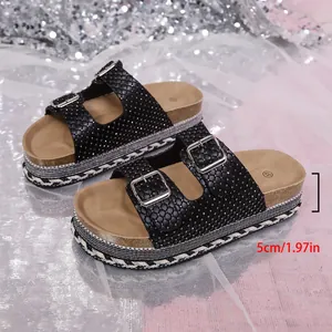 Detail of black rhinestone platform sandals with buckles and 5cm heel height