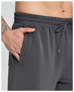 Detailed view of charcoal gray modal men's shorts with elastic waistband and side pocket