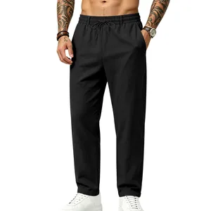 Detalle de pantalones casuales de lino negro para hombre con cordón ajustable y corte recto