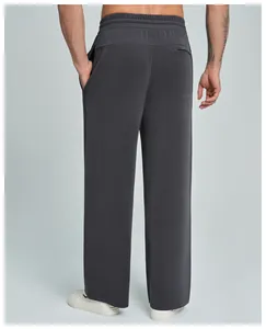 Rear view of comfortable men's dark grey modal straight-leg trousers for casual sports fitness