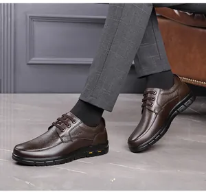 Side view of premium brown textured leather business casual dress shoes for men's fashion.