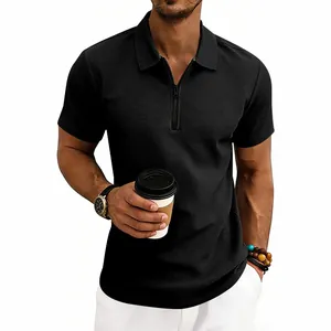 Men's minimalist black waffle knit polo shirt with quarter zip and short sleeves.