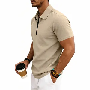 Detailed side view of a men's khaki waffle knit polo shirt featuring a modern zip collar