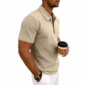 Detailed view of men's khaki waffle knit polo shirt with quarter-zip collar