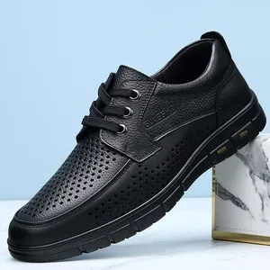 Men's breathable black perforated leather business casual shoes featuring a lace-up design