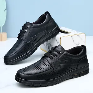 Men's business casual black perforated leather shoes with breathable hole design