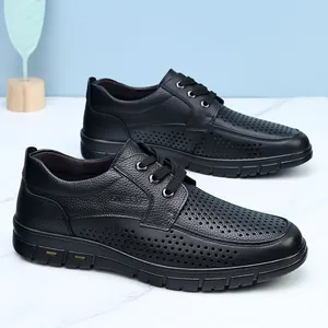 Breathable black perforated leather business casual shoes for men in a classic design style