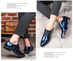 Detail views of glossy navy blue floral business shoes for men in classic British style