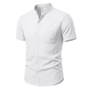 Detailed shot of white linen-textured men's short sleeve shirt with stand collar