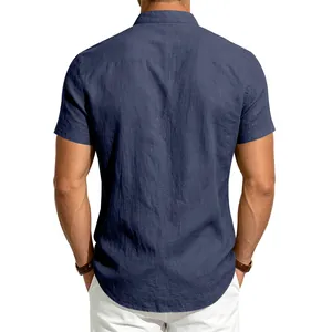 Back view of a minimalist men's navy blue linen short sleeve shirt with a retro stand collar