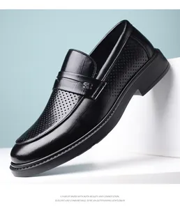 Black leather men's loafers with breathable perforated details and metal buckle ornament