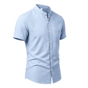 Perspective view showing fabric texture and pocket detail of men's blue linen shirt