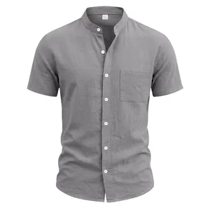 Close-up detail of grey casual linen shirt with stand collar and chest pocket
