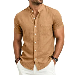 Detail of men's retro linen short-sleeved shirt with stand collar and pocket in camel