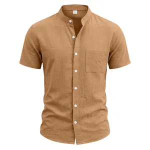 Detail of camel linen short sleeve shirt with retro stand collar and chest pocket