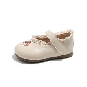 Adorable cream faux leather shoes for girls featuring delicate lace trim and mushroom embroidery